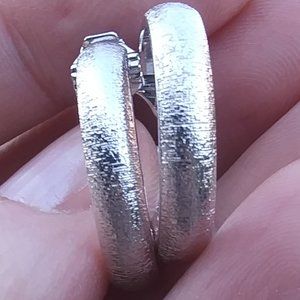 Vintage Monet silver tone hoop style earrings clip on